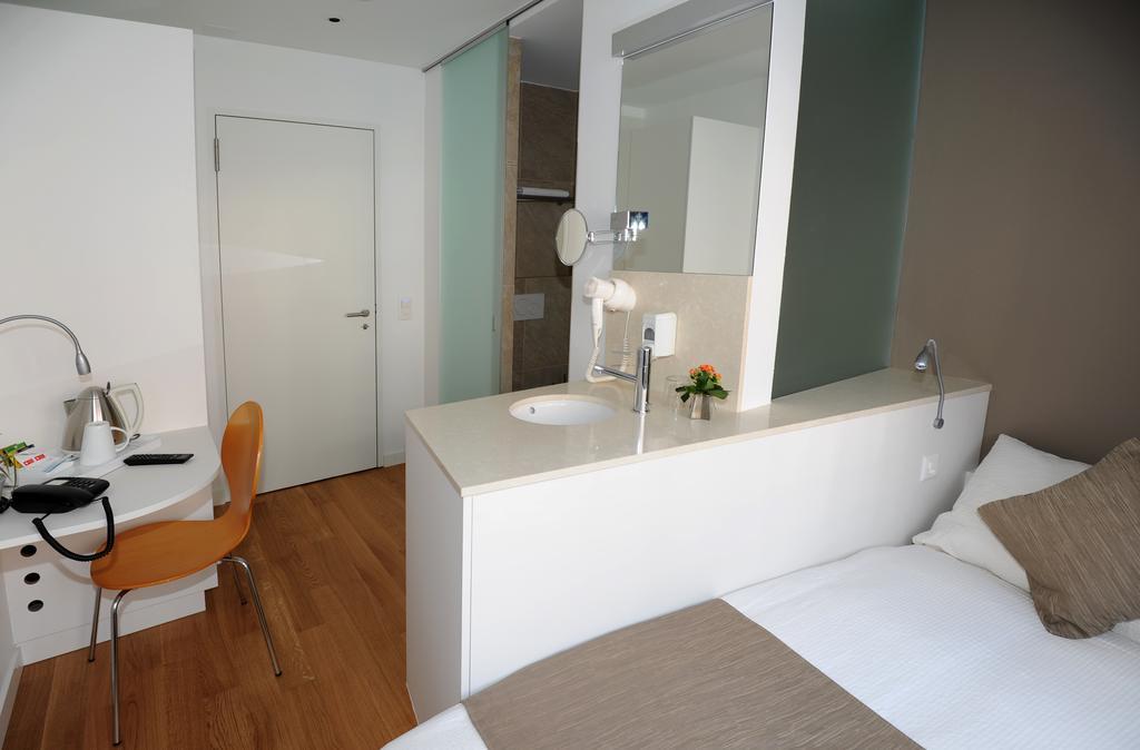 Hôtel Elite Sion Quarto foto