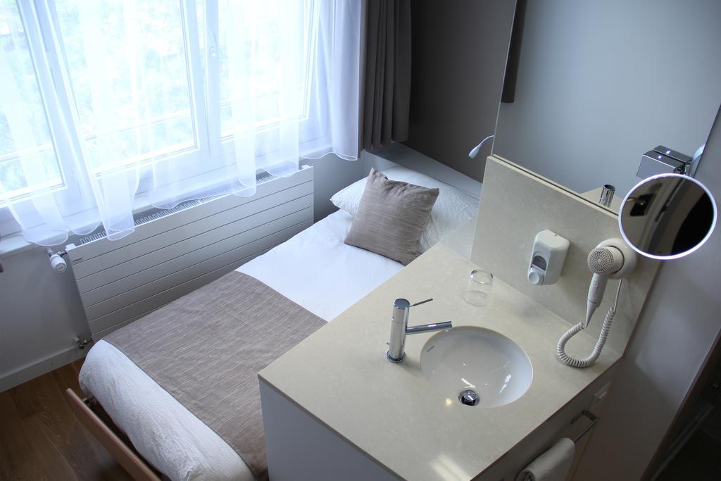Hôtel Elite Sion Quarto foto